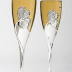two Silver toasting flutes from amantes