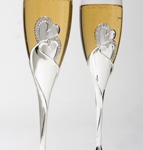 two Silver toasting flutes from amantes