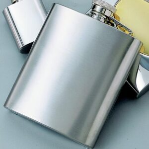 brushed stainless steel flask on a table