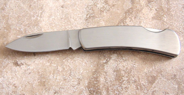 Engraved single blade stainless steel pocket knife