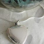 engravable Sterling silver heart locket with decorative border